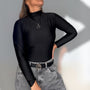 Polera Lu negra hombros lisos